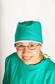 Nurse doctor surgeon surgery scrubs female woman surgical gown medical records hospital clinic glasses green health - AEN20A